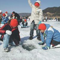 Kids fish at the Inje Icefish Festival