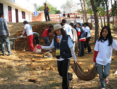 DOPAL girls leveling grounds for library building