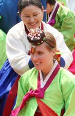 A foreign exchange student celebrates her coming of age ceremony in Korea on Monday (May 19).