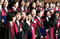 Female prosecutors smile during their official appointment ceremony at the Gwacheon Government Complex 