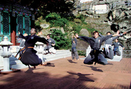 Visitors experience the Korean traditional Buddhist Zen martial art called 'sunmudo' at Gogolsa Temple. 
