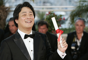 Park Chan-Wook poses with the Jury Prize award he received for his film 'Thirst' at a photo call following the awards ceremony during the 62nd Cannes Film Festival in France on May 24.