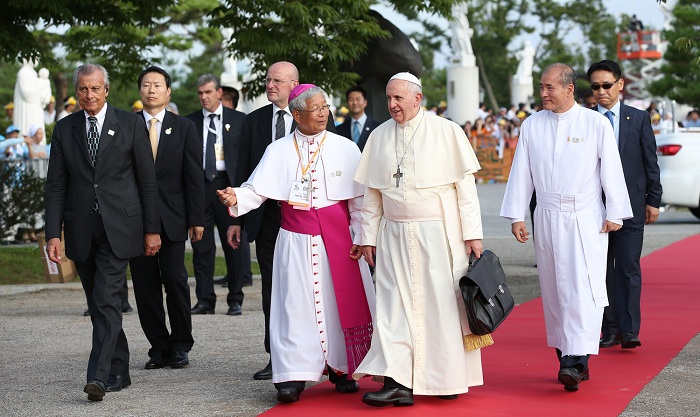 Pope Francis heads to the birthplace of St. Andrew Kim Dae-geon, guided by Nazarius Yoo Heung-sik, bishop of the Roman Catholic Diocese of Daejeon.