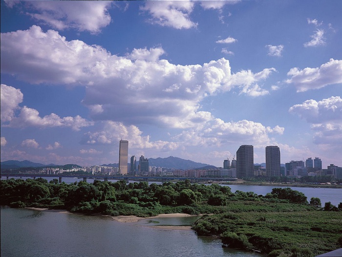 The towers of Yeouido loom over the landscape of Bamseom Island. (photo courtesy of Seoul City)
