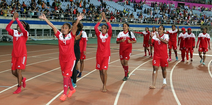 The Maldives participates in a preliminary match in the women's football competition during the 2014 Incheon Asian Games. They lose the game, but smile nonetheless as they wave to their fans and spectators. (photo: Yonhap News)