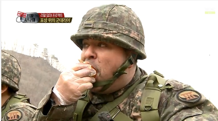 An episode of "Real Men" features Sam Hammington eating an "army hamburger," or a "<i>gun-dae-ria-a</i>," after running through a series of military drills.