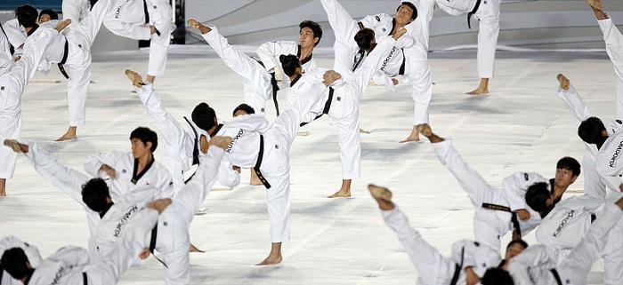 (From top) The Rainbow Chorus, the National Dance Company and the Kukkiwon's taekwondo demonstration team perform during the closing ceremony.