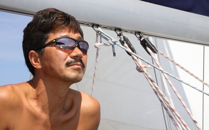 Pictured is sailor Kim Seung-jin on his yacht before he begins his adventure.