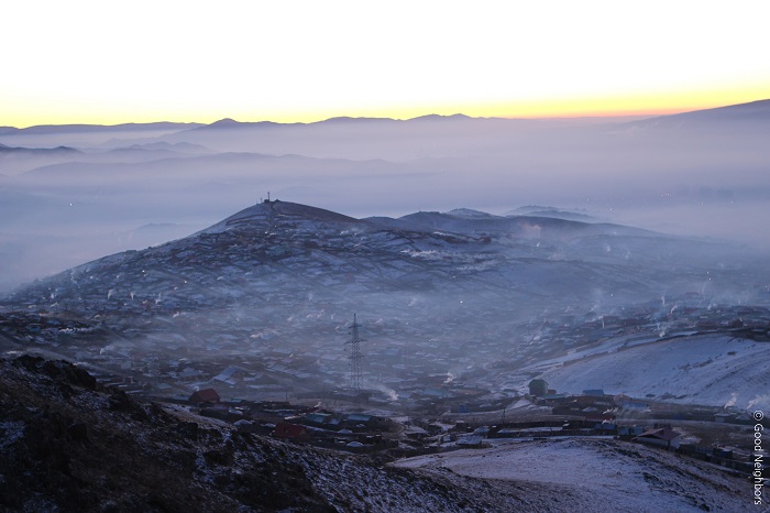  (Top) A <I>ger</I> is a traditional Mongolian home. (Bottom) The skies over Ulaanbaatar in the early morning are covered with a thick fog, possibly influenced by the use of coal as an energy supply.
