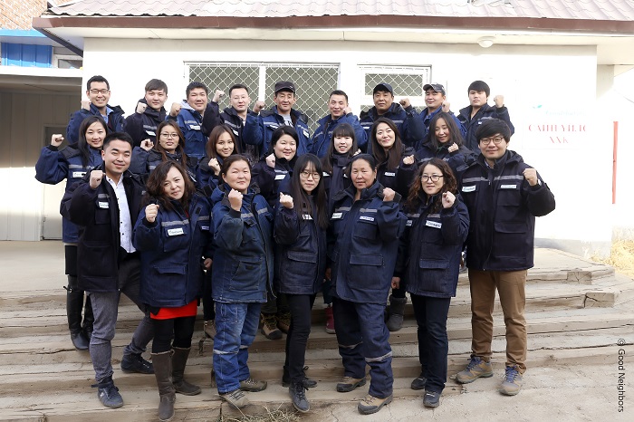 Workers at the Mongolian branch of Good Neighbors pose for a group photo.