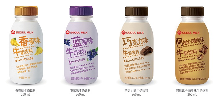 A variety of flavored milks -- banana, grape, chocolate and coffee -- are on sale in Chinese markets. 