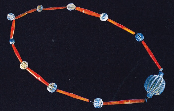 Tubular carnelian beads and lapis-lazuli beads are from ancient Syria (c. 2,500 B.C.). 