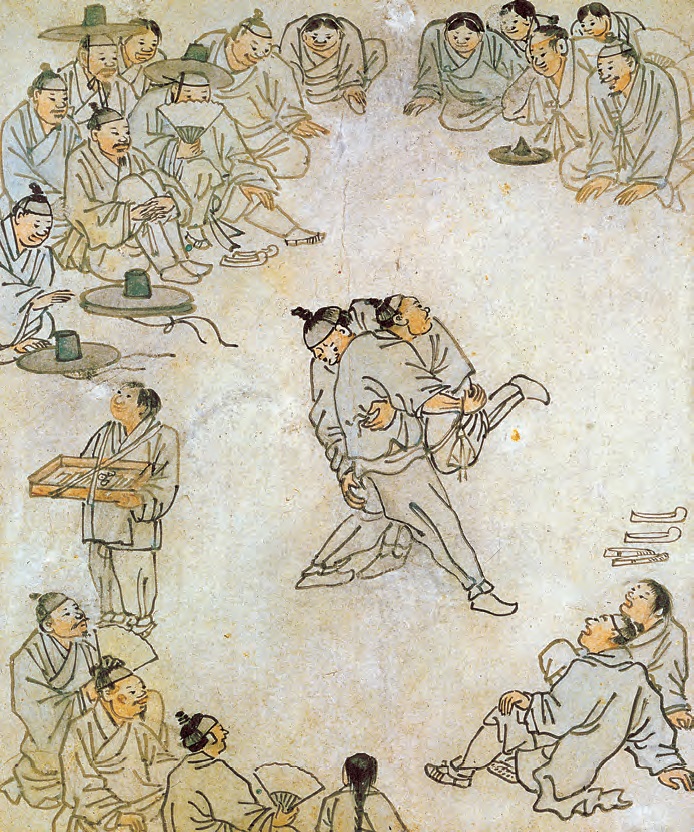 <b>Ssireum (Korean Wrestling) by Kim Hong-do (1745-1806).</b> This genre painting by Kim Hong-do, one of the greatest painters of the late Joseon Period, vividly captures a scene of traditional Korean wrestling where two competing wrestlers are surrounded by engrossed spectators.