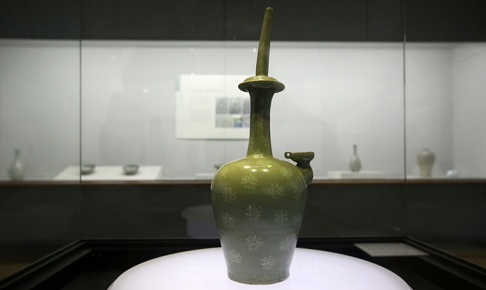 Gangjin Celadon Museum displays a wide variety of celadon wares from the 9th through to the 15th centuries. Pictured is Celadon Kundika with Inlaid Peony Design produced during the 13th century. 