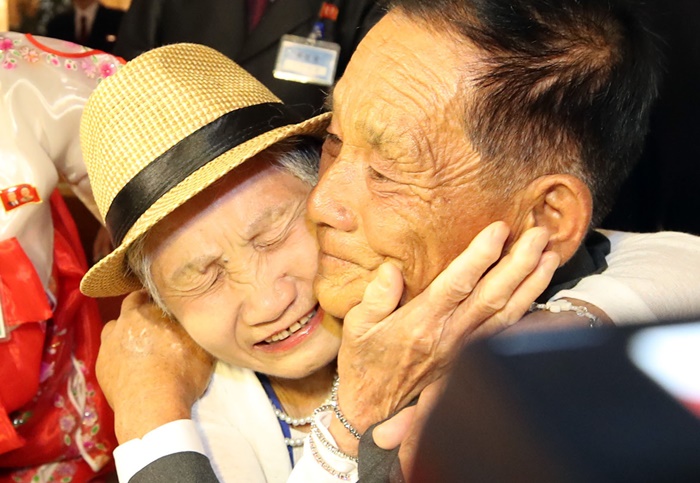 Lee Geum-seom, the mother from the South, as she is reunited with her son from the North, Ri Sangchol, is in tears during the 21st reunion for war-separated families, at the Mount Kumgang resort in North Korea on Aug. 20. (Yonhap News)