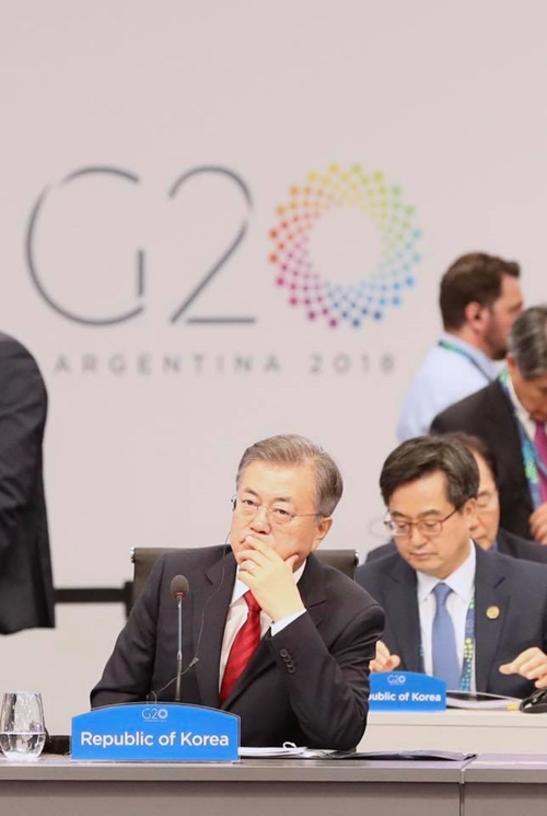 President Moon Jae-in on Dec. 1 listens to speeches during the G20 Leaders’ Summit in Buenos Aires, Argentina.
