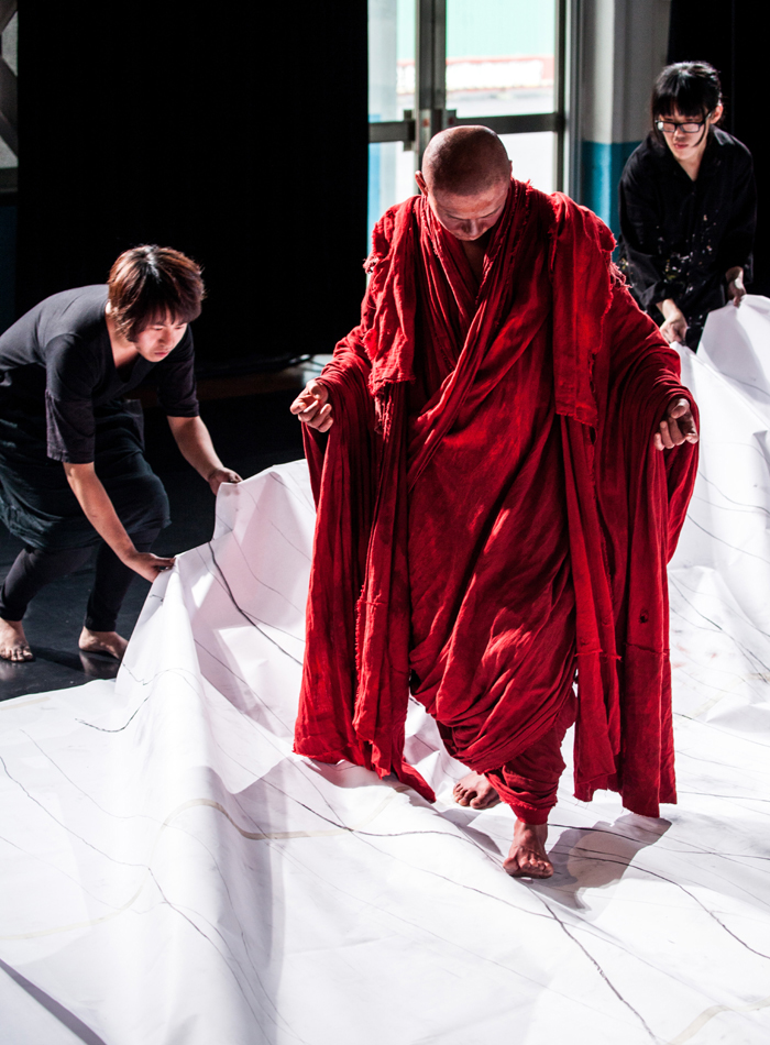 Taiwanese film director Tsai Ming-Liang (center) collaborates with the Asian Arts Theatre at the Asian Culture Complex on the play “The Monk From the Tang Dynasty” during the 2014 Vienna Festival in Vienna.