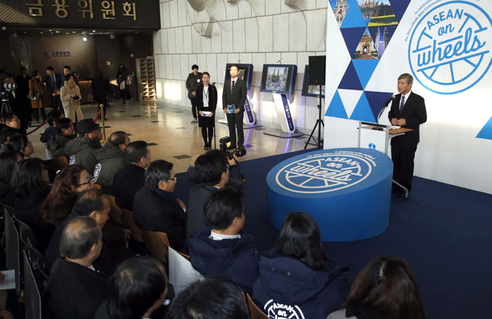Secretary General of the ASEAN-Korea Centre Chung Hae Moon delivers his congratulatory remarks during the launch ceremony for the ASEAN on Wheels buses, in Seoul on December 3.