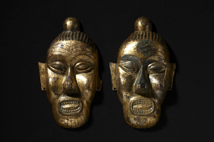 Face-shaped ornaments, Buyeo (c. 200 B.C.-A.D. 494), gilt bronze, 27.4cm high.