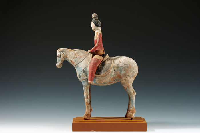 Lady riding a horse, Astana Tombs, Turpan, 7th-8th century, color on clay, 38.5cm high.