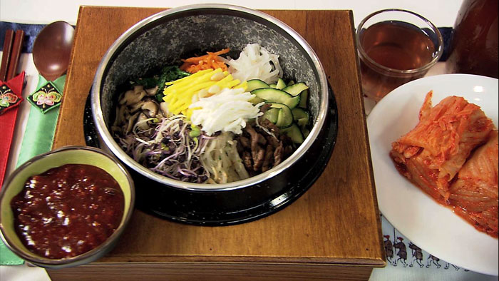 Bibimbap mixed rice with vegetables and meat is one of the four Korean dishes featured on Njam TV.