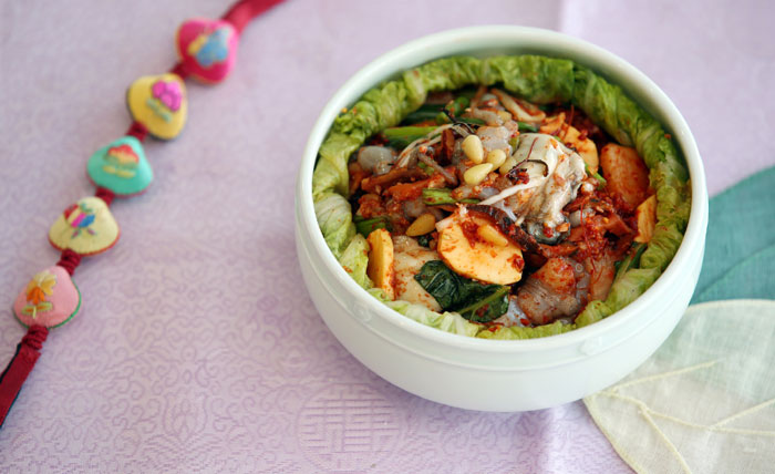 <i>Bossam kimchi</i>, also known as <i>ssam kimchi</i>, is made from delicious ingredients, such as baby octopus, oysters, chestnuts, jujubes and brown oak mushrooms. This dish is generally only prepared on special occasions, such as holidays or parties.