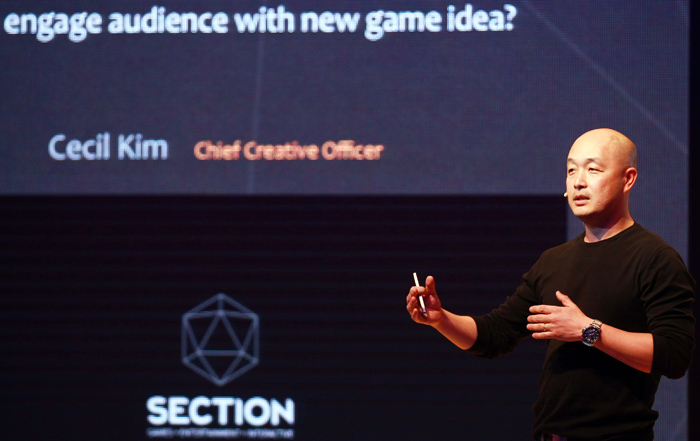 Creative director Cecil Kim talks about the secret to making a video game look like a movie, during his speech at the 2014 Content Insight seminar. (photo courtesy of the KOCCA)