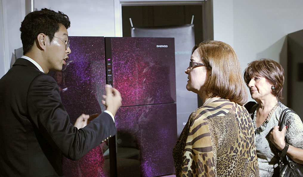 Customers learn about Daewoo Electronics' brand-new line of refrigerators during a launch event held last month in Lima's romantic and Bohemian neighborhood of Barranco.