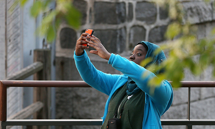 A student from the Democracy Prep Public School takes a selfie at N Seoul Tower on April 14. (photo: Jeon Han)