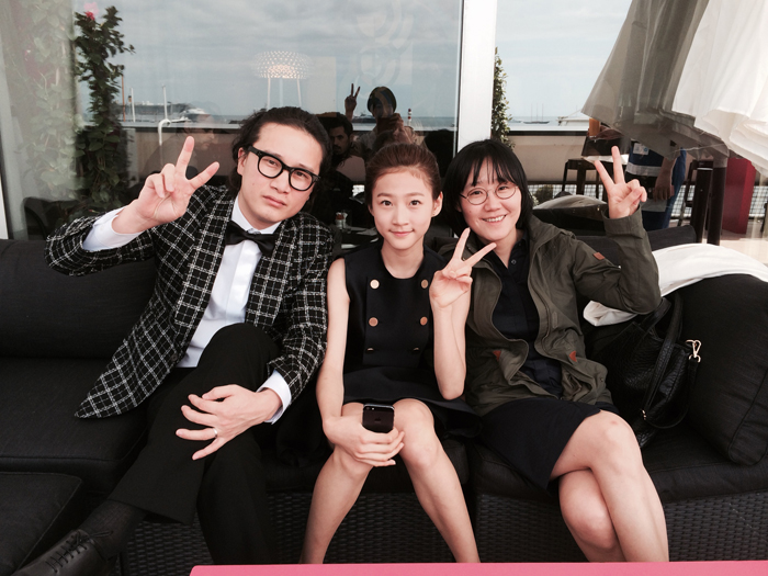 (From left) Song Sae-byeok, Kim Sae-ron and Jung July pose for a photo at Cannes. 