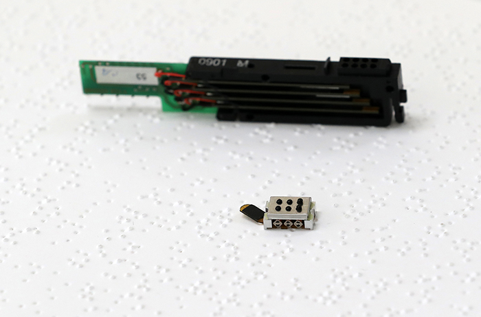 The braille cell used in existing braille equipment (top) is much larger than Dot’s new mini braille cell, dubbed an actuator (bottom). This new smaller braille cell will be inserted in all products developed by Dot, all of which help to improve the day-to-day life of the visually impaired.