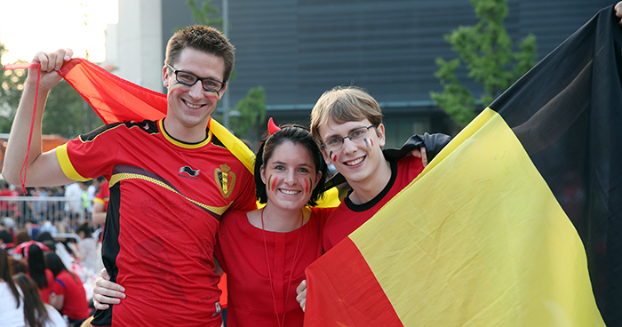 Soccer fans hold up the Belgian national flag to cheer for their team in Gwanghwamun Square on June 27. The Belgian fans enjoyed the World Cup match amidst the cheering Korea fans. (photo: Jeon Han) 