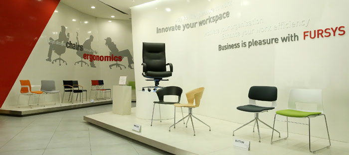 A wide range of office furniture can be seen at a Fursys showroom. The black chair in the center was used by leaders at the 2012 Nuclear Security Summit in Seoul.