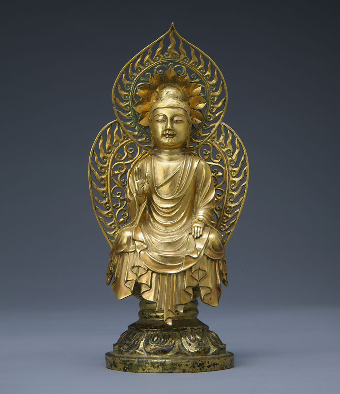 A seated gold Amitabha Buddha is from the pagoda at the site of Hwangboksa Temple.