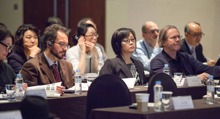 Participants in the 'International Seminar on Innovative Traditional Korean Paper, Hanji,' listen as a series of speakers deliver their remarks.