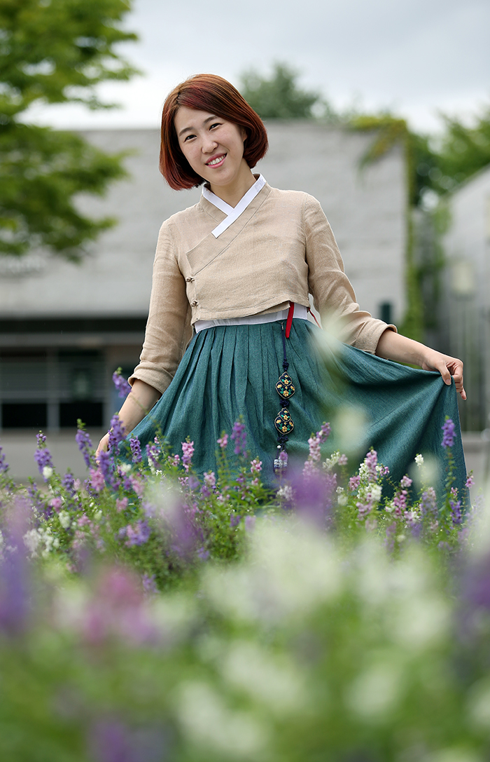 Sonjjang Design Hanbok CEO Hwang Yi Seul wearing her own design (photo: Jeon Han)