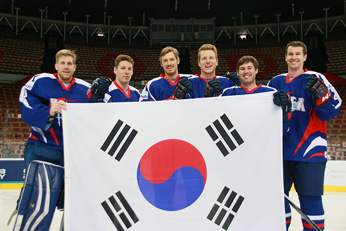 Nationalized Korean athletes on the men’s ice hockey team pose for a photo at the International Ice Hockey Federation in Poland in April 2016. These athletes are (from left) Matthew Dalton, Michael Testwuide, Brock Radunske, Eric Regan, Michael Swift and Bryan Young.