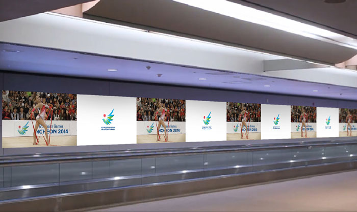 Photos of rhythmic gymnast Son Yeon-jae, one of the PR ambassadors for the Incheon Asian Games 2014, decorate a wall at Incheon International Airport. (photo courtesy of the Incheon Asian Games Organizing Committee)