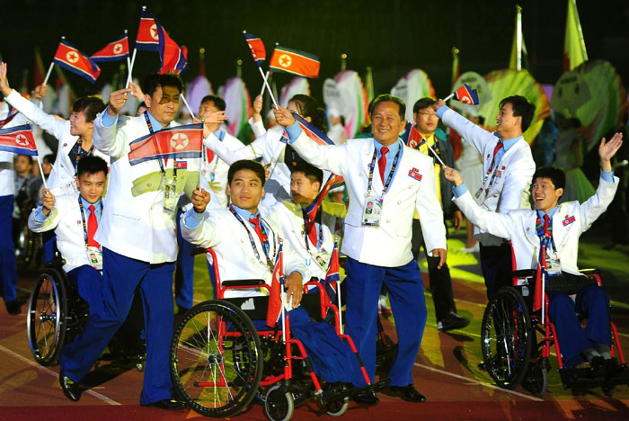 Athletes from North Korea enter the venue for the closing ceremony of the Incheon Para Asian Games 2014.