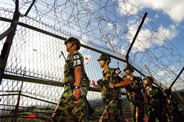 Soldiers at the demarcation line in the Demilitarized Zone near Cheorwon