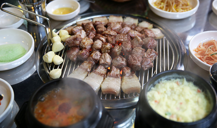 Roasted Jeju pork offers a chewy and clean meaty taste with little fat. This is one of the must-have dishes on Jeju Island. 
