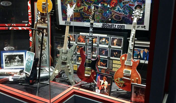 Kim Se-hwang’s Yamaha electric guitar (second from right) is displayed in the show window of the flagship Guitar Center store that hosts Hollywood's RockWalk, a hall of fame honoring musical artists in March 2014. (photo: courtesy of Kim Se-hwang)