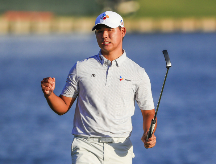 Kim Si Woo celebrates after finishing 10 under to win the final round at the Players Championship, at the Stadium course at TPC Sawgrass, Florida, on May 14.