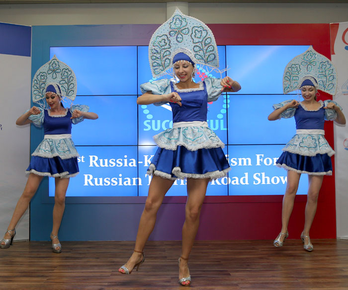 Dancers perform a Russian folk dance at the forum on May 30.