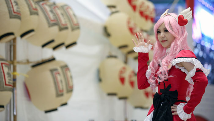 A participant in the cosplay competition poses for a photo as she takes part in the Korea-Japan Festival 2014. 