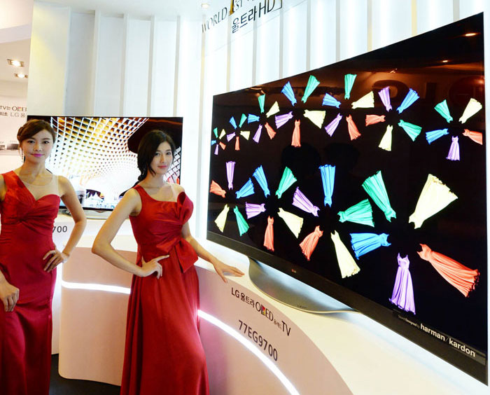 LG’s 65-inch UHD OLED TV has a thin, slightly curved screen and can be hung on the wall.