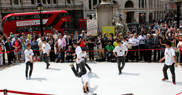  B-boy group Gamblers Crew featuring dynamic dance moves on stage in front St. Paul's Cathedral. 