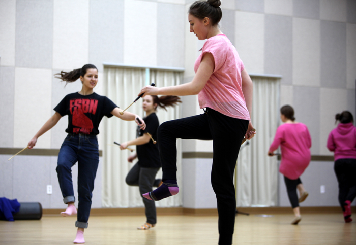 A group of university students from Vladivostok learn the footwork required for a <i>samulnori</i> performance, part of a 15-day program at the Jindo National Gugak Center.