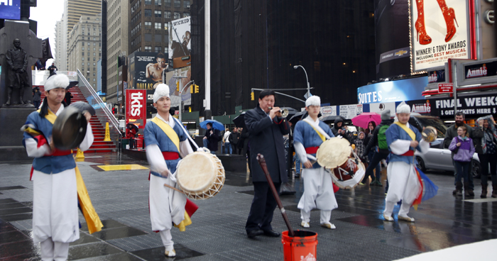 A percussion quartet performs in the heart of New York City on March 19. 