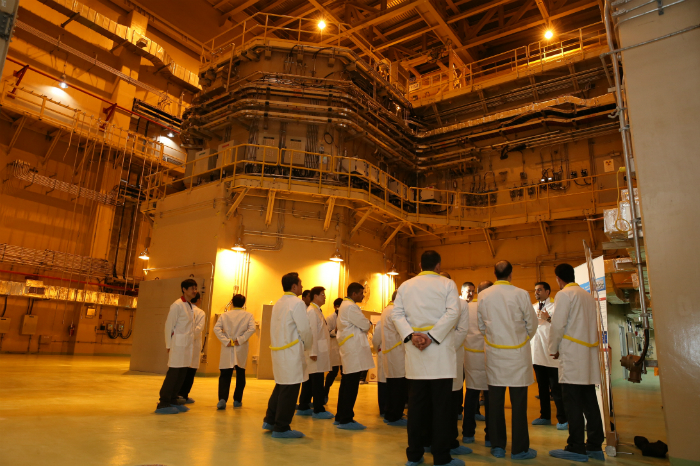 Government officials and researchers of Korea and Jordan inspect nuclear boiler room of the JRTR.